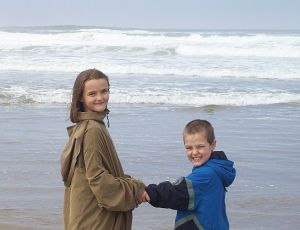 Shelsea & Haiden walking out to the waves